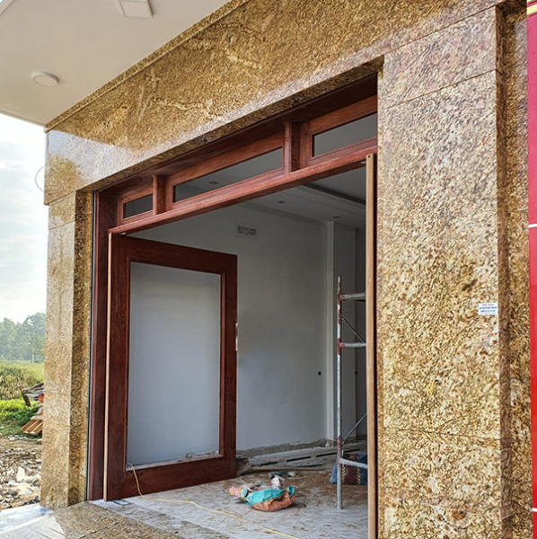 Gạch giả đá hoa cương màu vàng tại Namy được ứng dụng cho hạng mục ốp mặt tiền